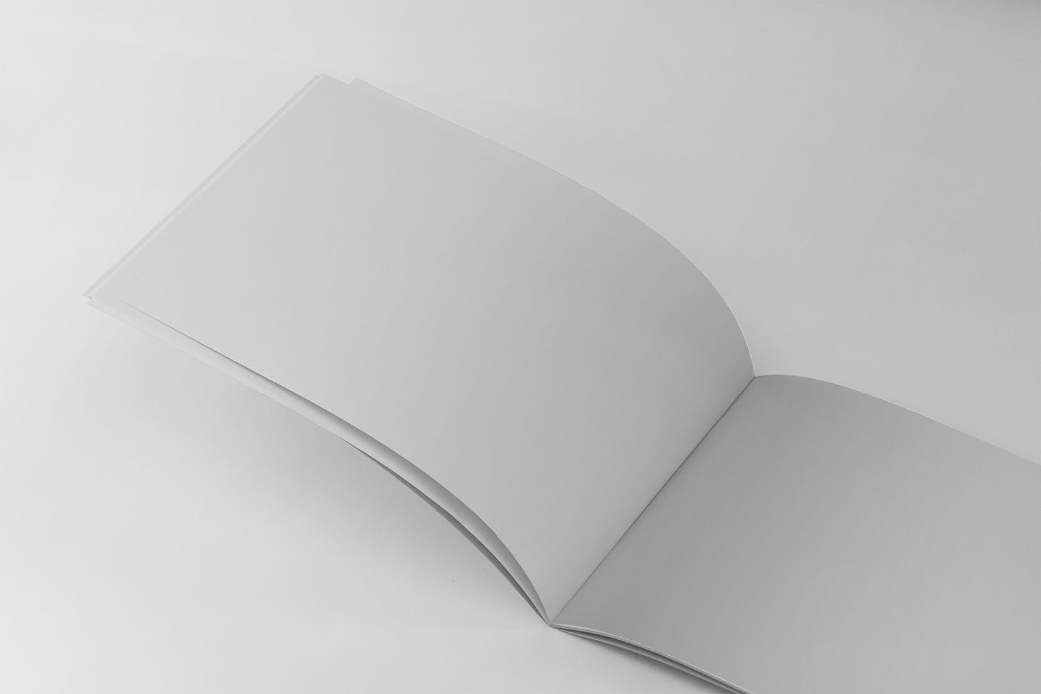 横版设计企业&品牌宣传册左侧特写图样机蚂蚁素材精选模板 US Half Letter Brochure Mockup Closeup Left Page插图(1)