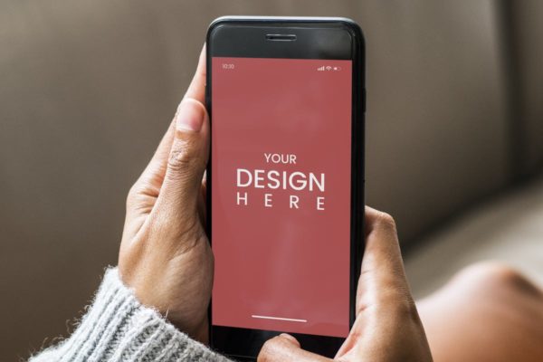 APP界面设计手持iPhone场景样机素材v1 Woman listening to music through the phone