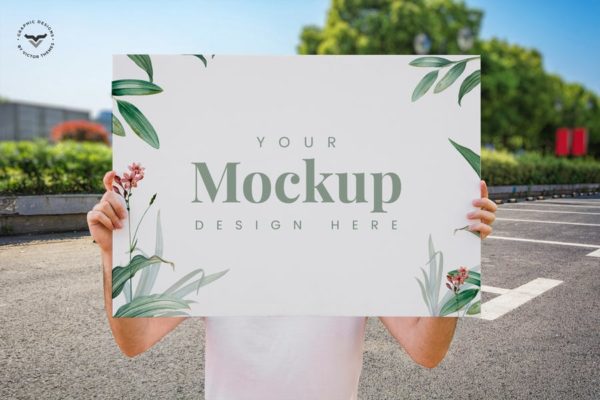 男子展示海报设计效果图样机大洋岛精选 Man Presenting Poster Mockup