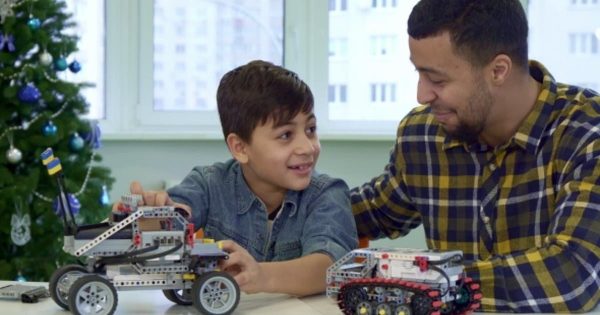 父与子亲子游戏视频素材 Father and Son Play with Toy SUV