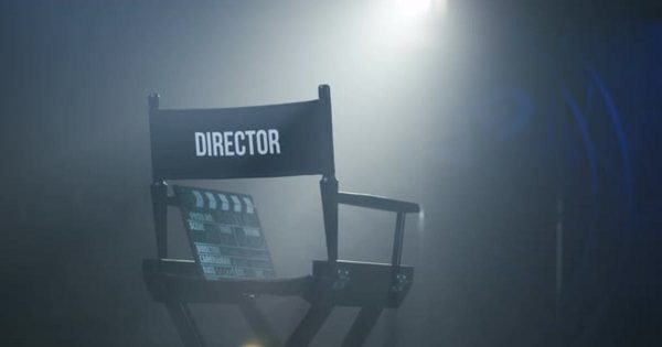 拍摄现场灯光下的导演椅场景视频 Chair of Director with Clapboard in Spotlight